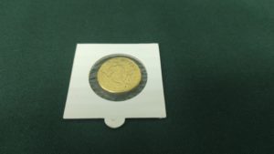 Монета "Мамонт-Биатлонист", латунь