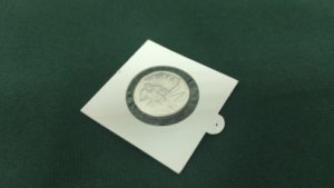 Монета "Мамонт-Хоккеист", алюминий